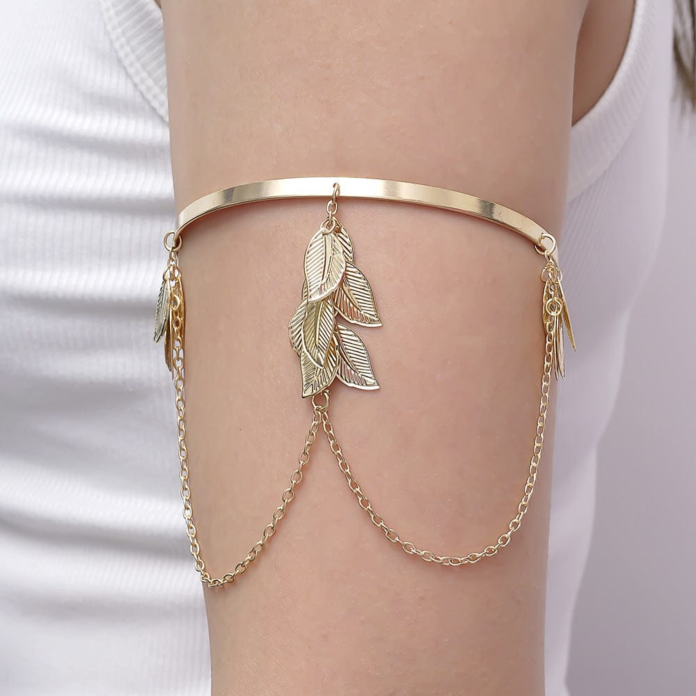 Handcrafted Gold-plated Geometric Cuff Bracelets And Boho-chic Metal Tassel Arm Rings With Vintage-inspired Exaggerated Water Drop Designs, Offering Unisex Luxury Accessories In Open Bangle Styles - Norellé