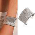 Handcrafted Gold-plated Geometric Cuff Bracelets And Boho-chic Metal Tassel Arm Rings With Vintage-inspired Exaggerated Water Drop Designs, Offering Unisex Luxury Accessories In Open Bangle Styles - Norellé
