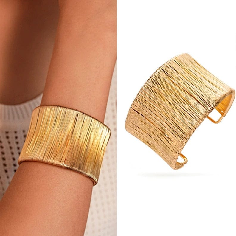 Handcrafted Gold-plated Geometric Cuff Bracelets And Boho-chic Metal Tassel Arm Rings With Vintage-inspired Exaggerated Water Drop Designs, Offering Unisex Luxury Accessories In Open Bangle Styles - Norellé