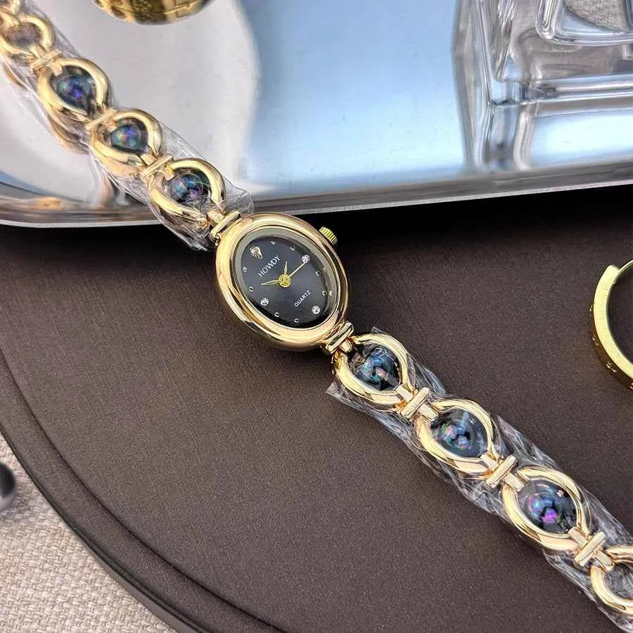 Ladies' Oval Sun Print Rhinestone Dial Elegant Lady Quartz Watch