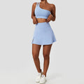 Light blue athletic skirt and one-shoulder crop top set from Black One-Shoulder Sports Bra and Leggings Tennis Suit for women