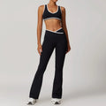 Black athletic two-piece set with white trim, sports bra, flare yoga pants, ideal for workout outfits fitness