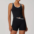 Black athletic tank top and biker shorts set with white trim for fitness sportswear