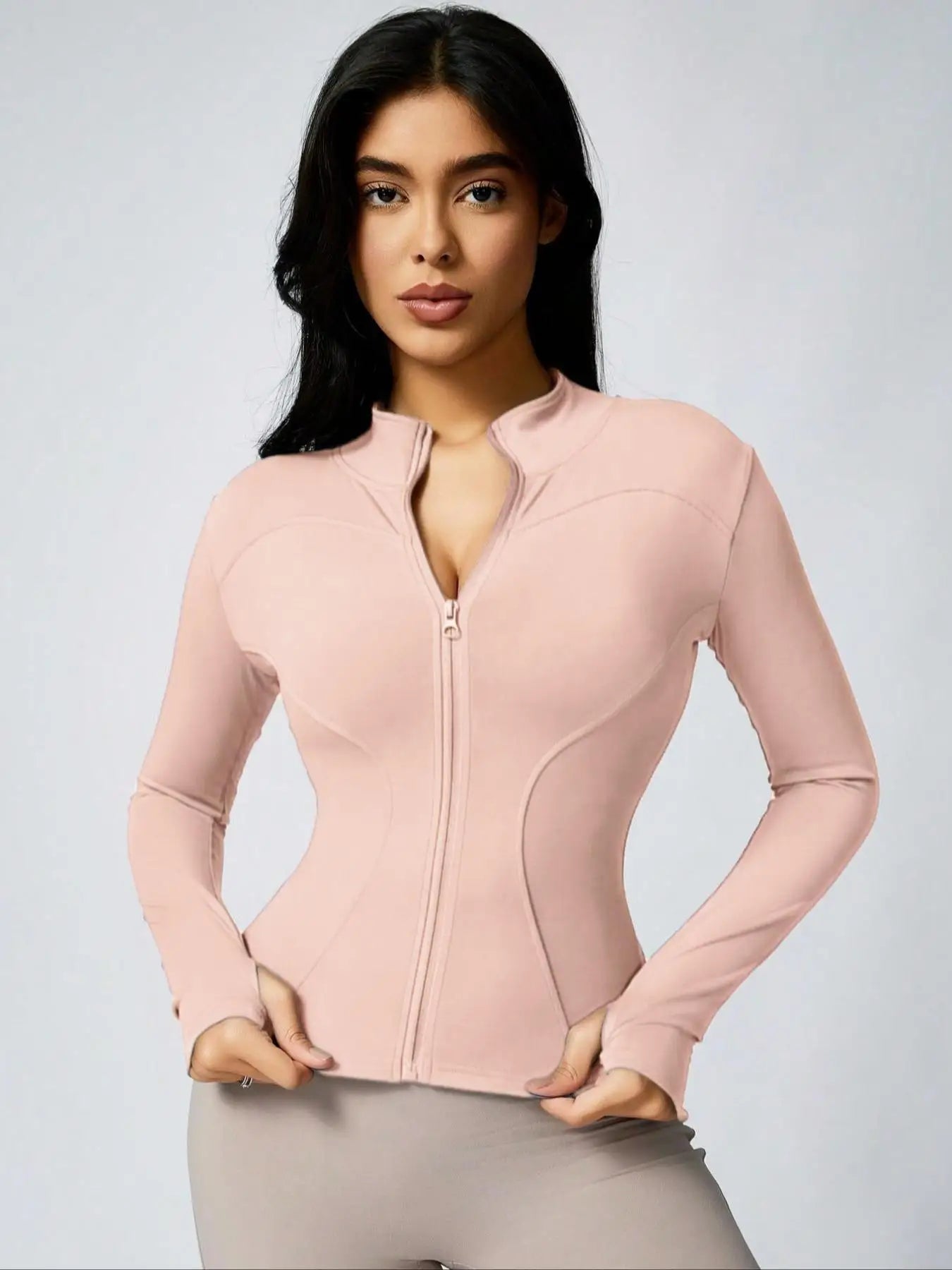 Brown cropped athletic jacket in light pink with full front zipper