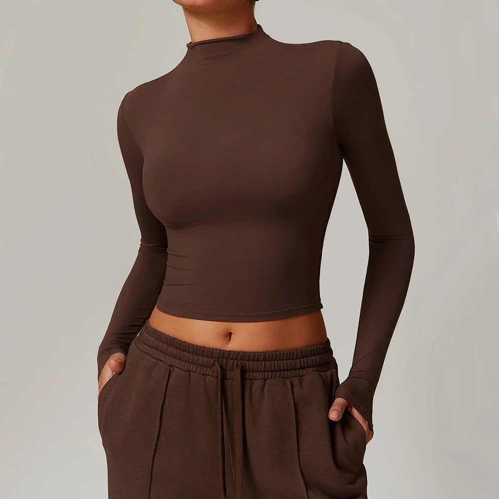 Dark brown long sleeve yoga cropped top with mock neck and thumbholes