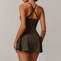 Olive green sleeveless athletic dress with criss-cross back and flared skirt for sportswear gym jumpsuits