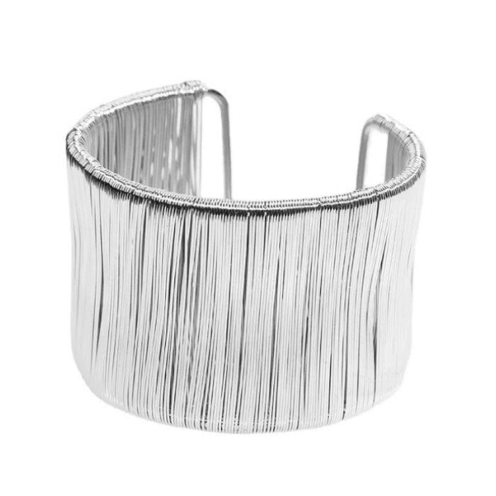 Handcrafted Gold-plated Geometric Cuff Bracelets And Boho-chic Metal Tassel Arm Rings With Vintage-inspired Exaggerated Water Drop Designs, Offering Unisex Luxury Accessories In Open Bangle Styles - Norellé