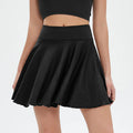 Black high waisted tennis mini skirt with wide waistband and side pocket