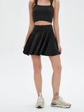 Black high waisted tennis mini skirt with side pocket and crop top