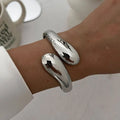 Irregular Water Drop Metal Wide Spring Bangles - 2427 Silver