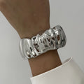 Irregular Water Drop Metal Wide Spring Bangles