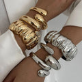 Irregular Water Drop Metal Wide Spring Bangles
