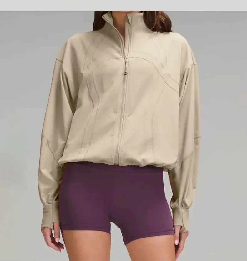 Woman in relaxed fit athletic women outdoor jacket with stand collar