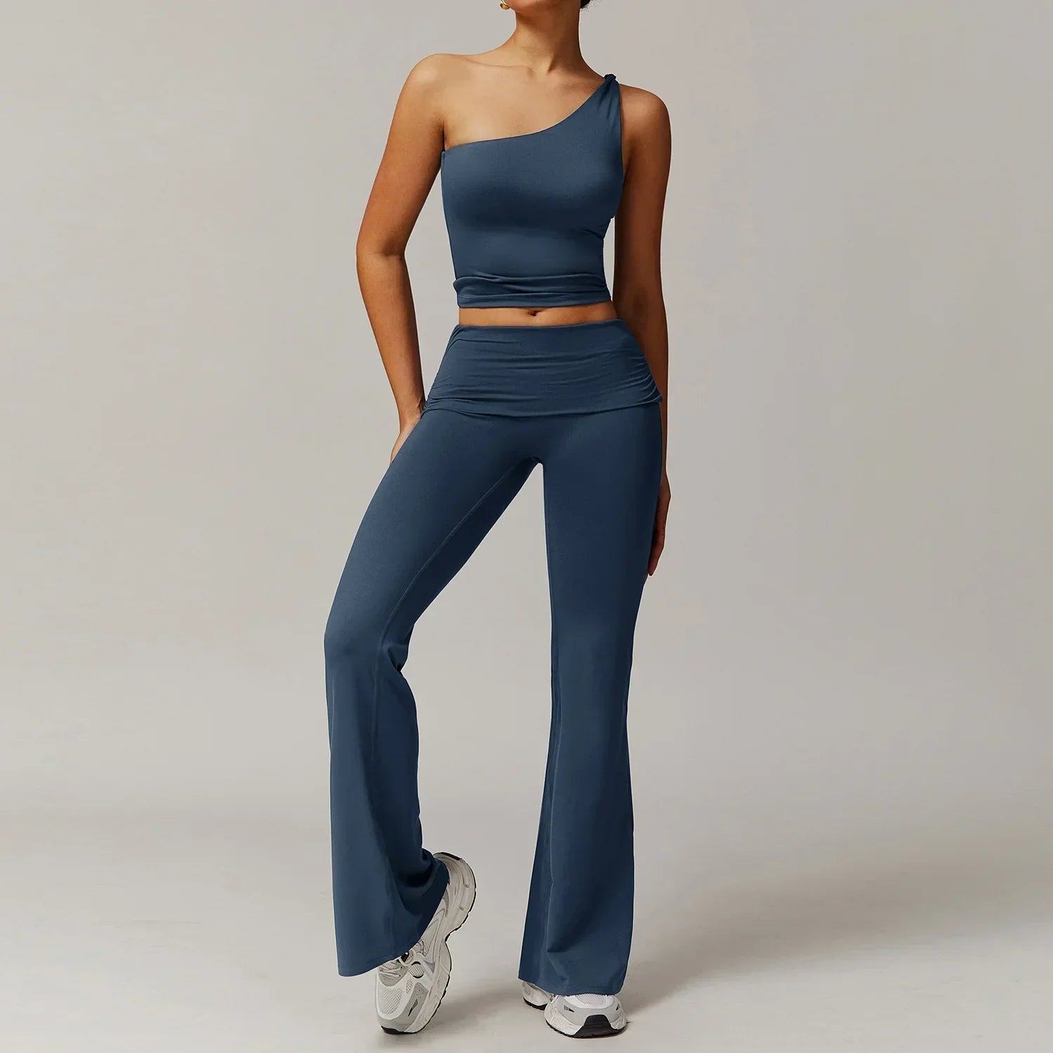 Light blue 2pcs yoga set with one-shoulder crop top and flared pants for women gym clothing