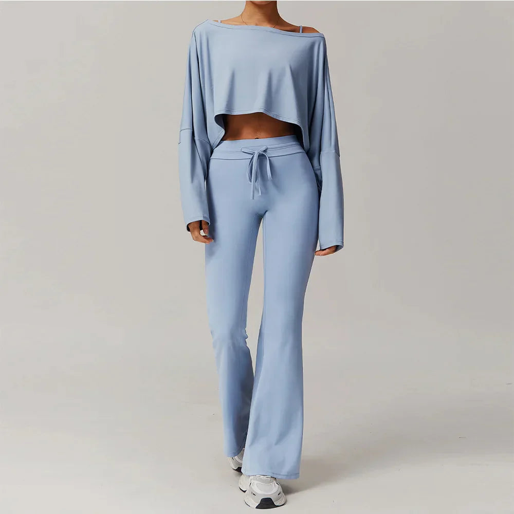 Light blue women tracksuit yoga set with crop top and flared sweatpants
