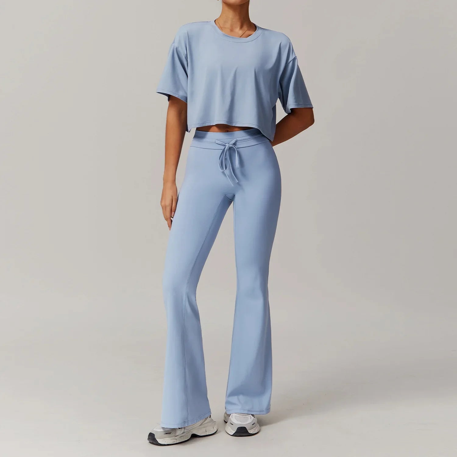 Light blue womens sportswear 2pcs set featuring crop top and flared sweatpants for women tracksuit yoga