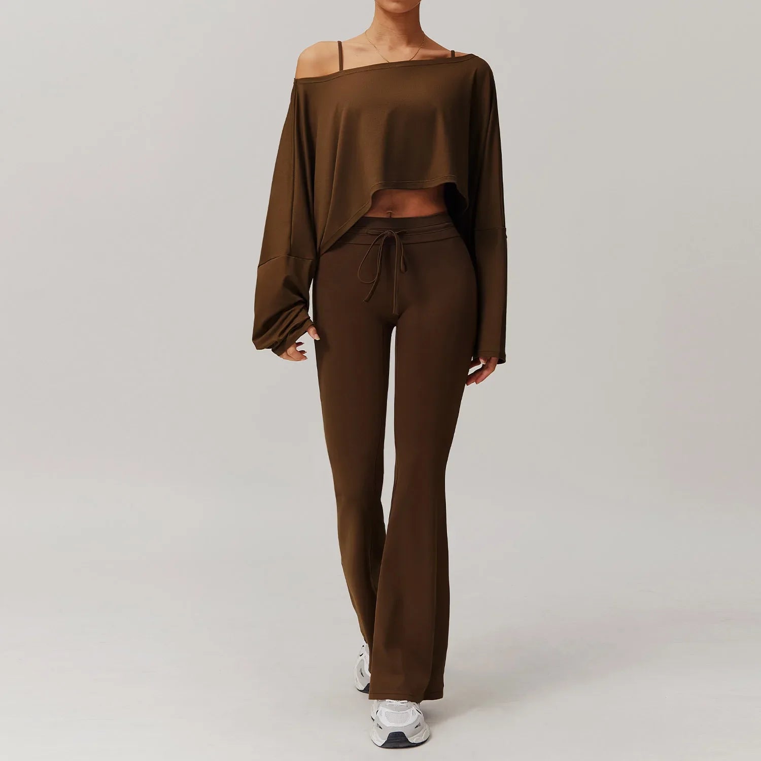 Women tracksuit yoga in brown featuring off-the-shoulder crop top and flare-leg pants
