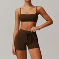 Dark brown ribbed sportswear 2pcs women set featuring sports bra and drawstring shorts