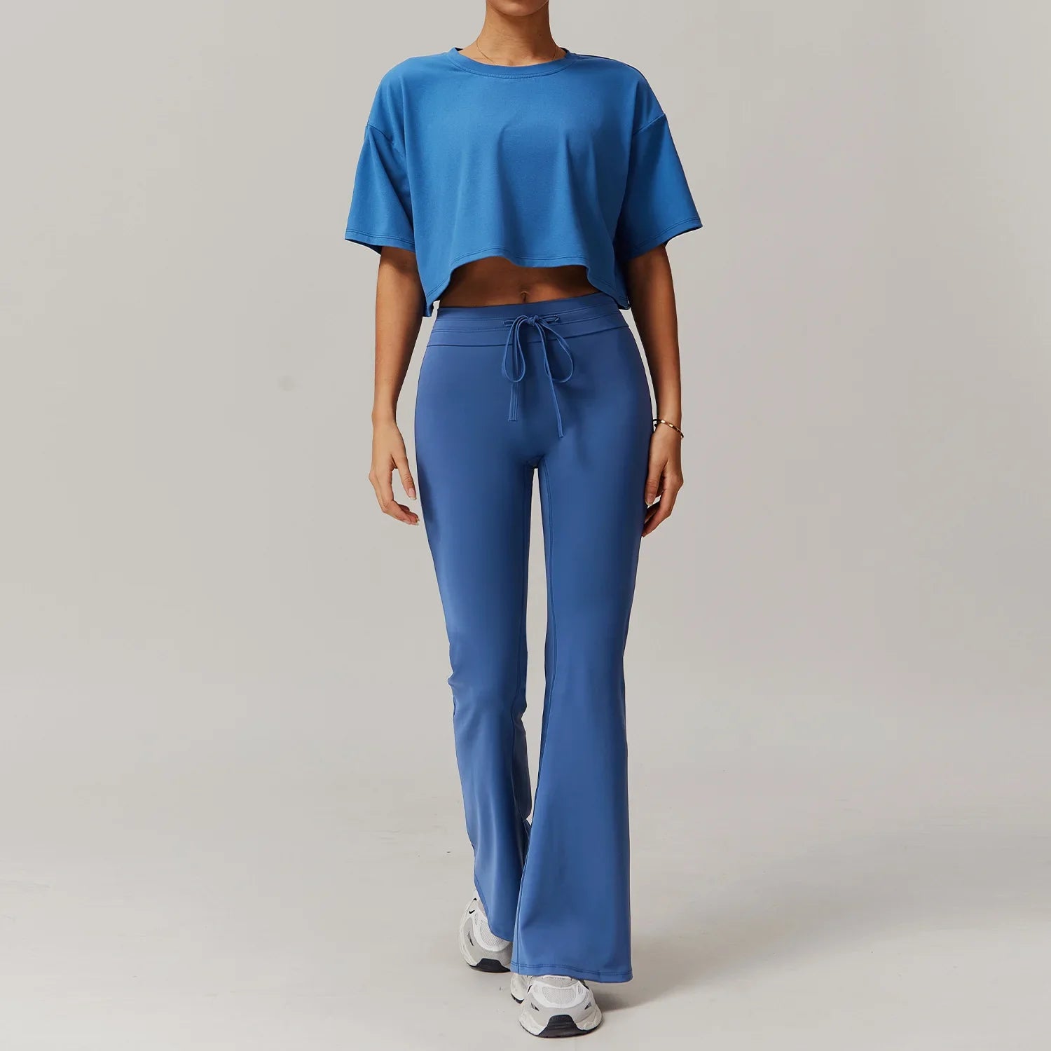 Light Blue Womens Sportswear 2pcs Set featuring cropped T-shirt and flared sweatpants