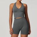Light pink seamless gym set with halter top and biker shorts