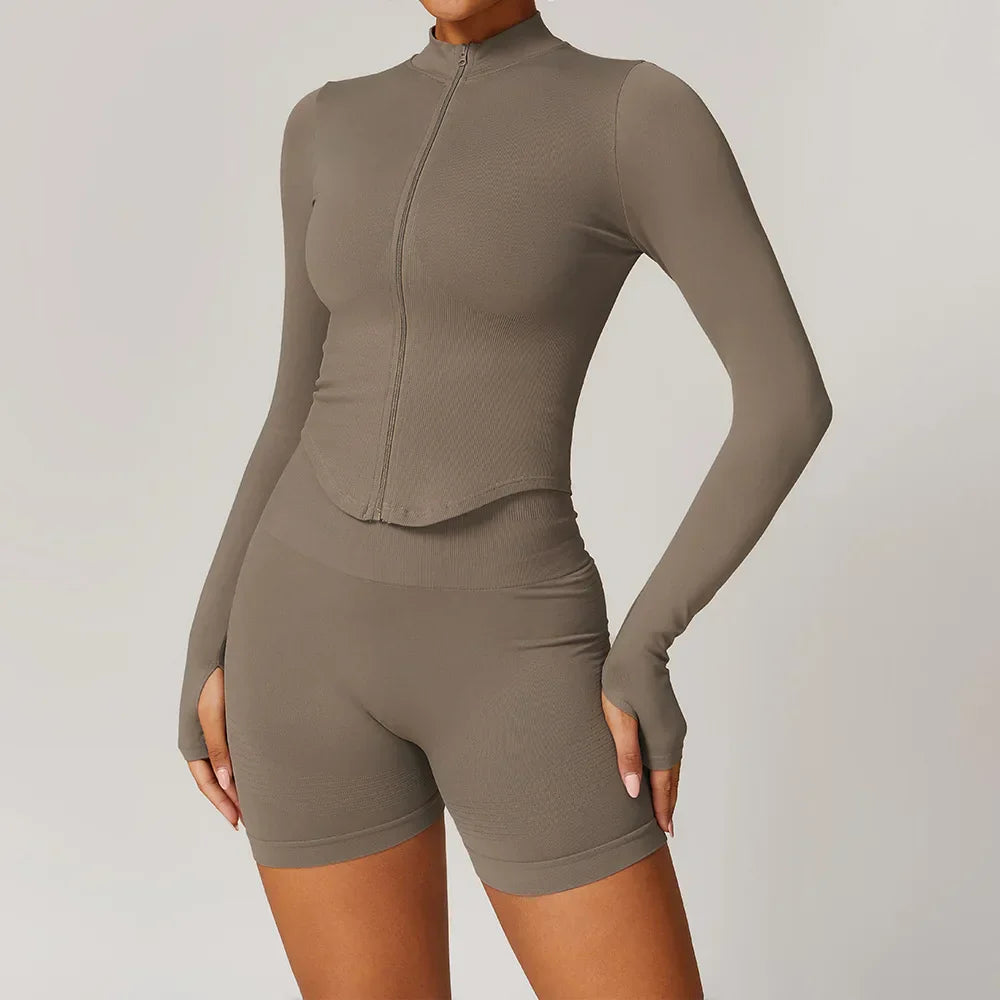 Light pink seamless gym set with taupe athletic top and shorts