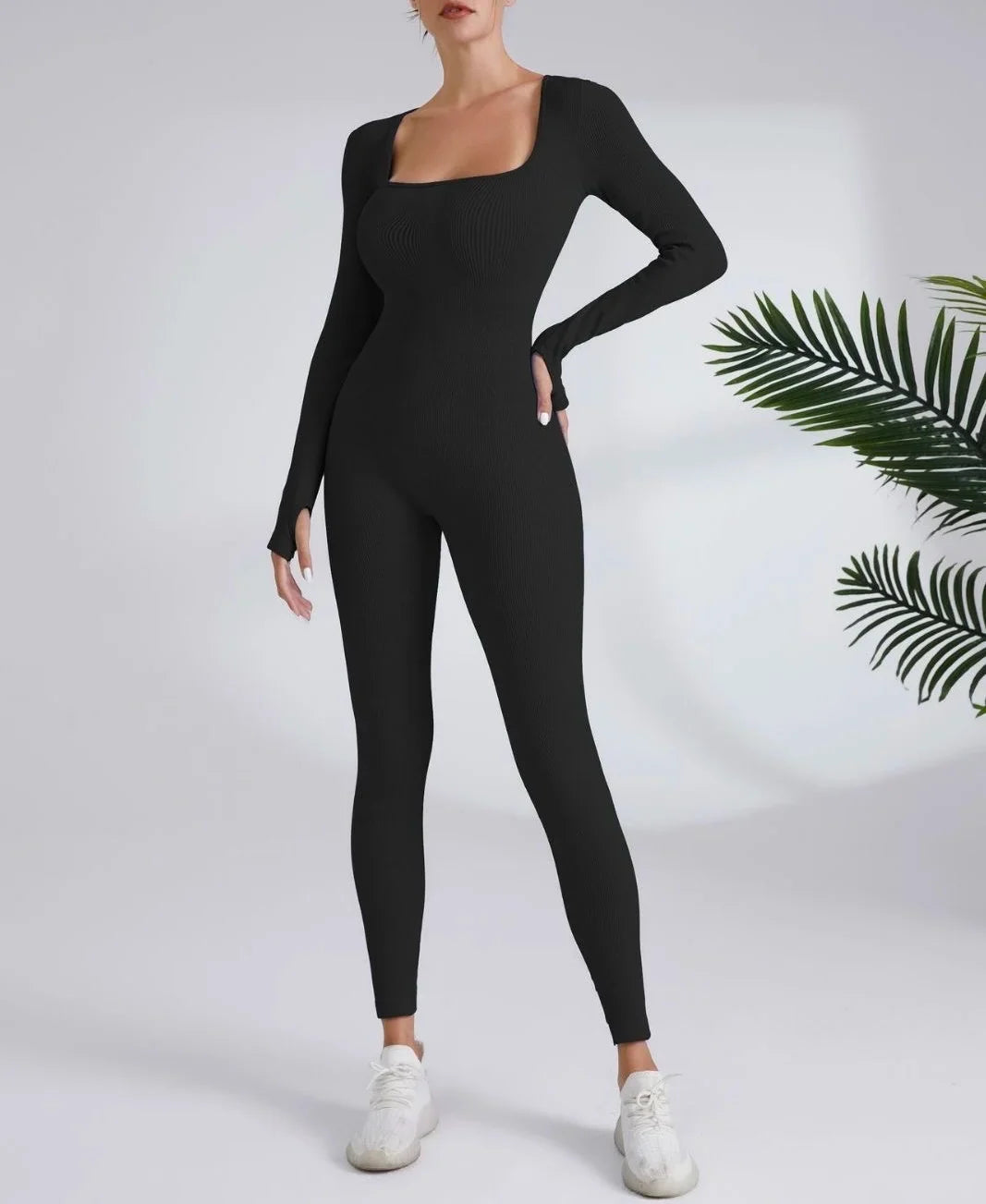 Black long-sleeve ribbed knit jumpsuit with square neckline and thumbholes for dry running fitness