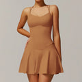 Off white strappy mini dress with fitted bodice and flared skirt