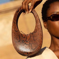Oval Snake Pattern Embossed Handbag