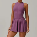 Plum sleeveless women yoga romper with pleated flared skirt