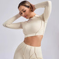 Light cream seamless yoga long sleeve cropped top with exposed stitching