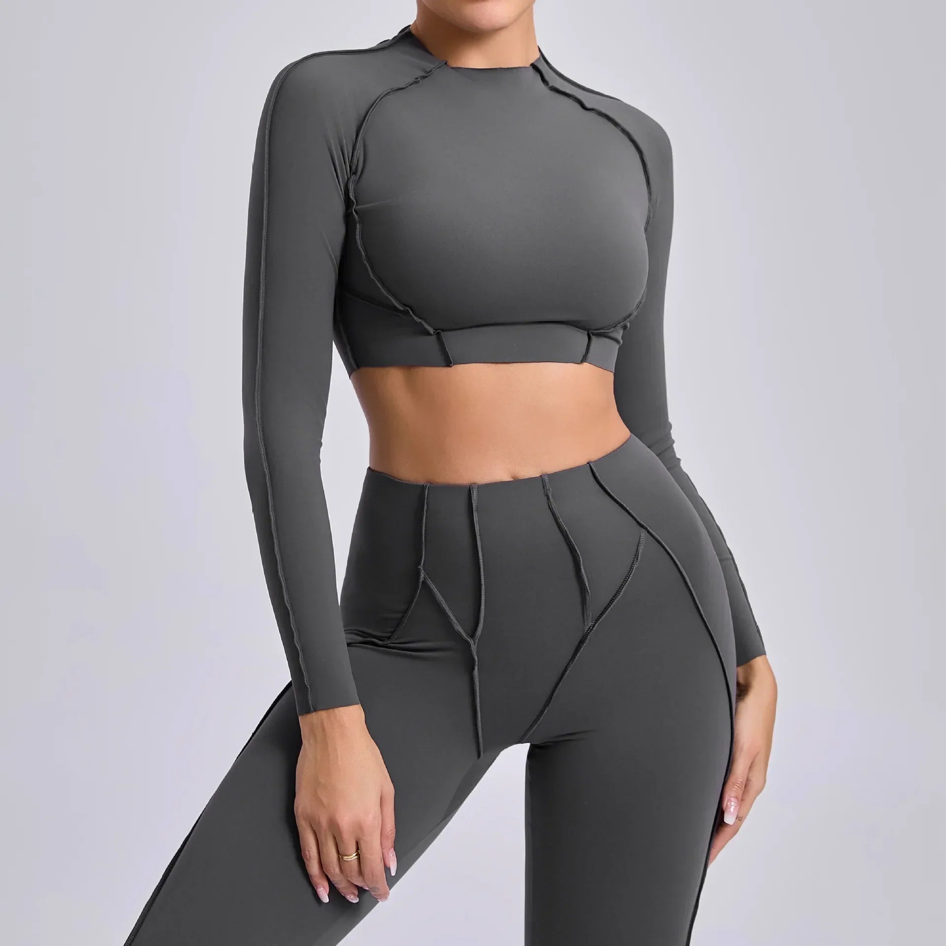 Dark gray seamless yoga long sleeve cropped top with matching leggings