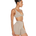 Beige stretchy soft training set with compression sports bra and biker shorts