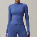 Blue full-zip athletic jacket and matching leggings, ideal for yoga long sleeve and long sleeve sports activities