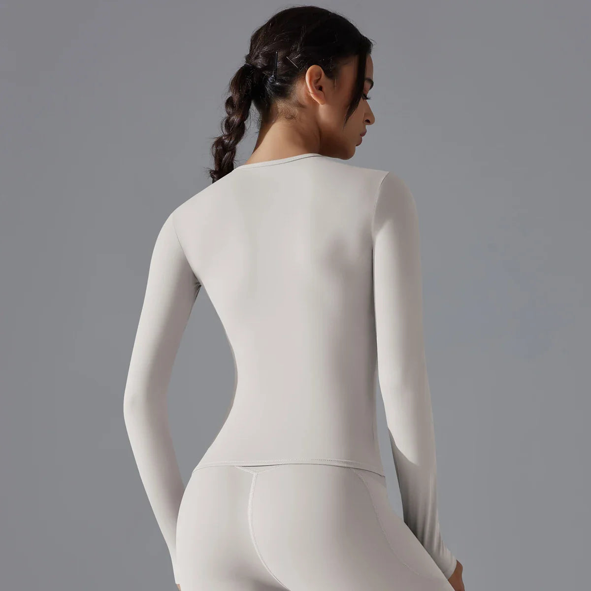 Women long sleeve light grey crew neck athletic top with leggings