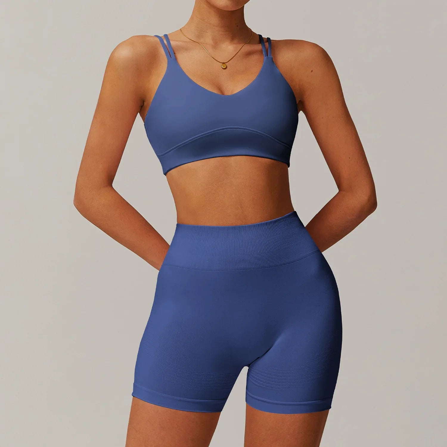 Indigo women’s yoga suit 2pcs with V-neck sports bra and high-waisted biker shorts