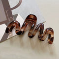 Women’s Wavy High Glossy Amber Brown Plastic Hair Clip